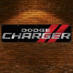 "Celebrate the power and performance of the iconic Dodge Charger with this 2x8 ft banner, a must-have for muscle car enthusiasts and Dodge fans. Featuring bold Dodge Charger branding and striking graphics, this banner adds a dynamic touch to any garage, workshop, man cave, or car show display. Crafted from durable, high-quality materials, it ensures long-lasting vibrancy and is suitable for both indoor and outdoor use. Whether you're showcasing your passion for the Charger’s legacy in American muscle cars or creating a standout décor piece, this banner is perfect for expressing your love for Dodge’s blend of style, speed, and performance."