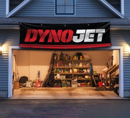 "Enhance your space with this 2x8 ft Dynojet flag banner, perfect for motorcycle enthusiasts and performance parts fans. Featuring bold Dynojet branding and sleek graphics, this banner is an ideal addition to garages, workshops, man caves, or motorcycle show displays. Crafted from durable, high-quality materials, it ensures vibrant colors and long-lasting appeal, suitable for both indoor and outdoor use. Show off your passion for motorcycle tuning and high-performance parts with this eye-catching banner that celebrates Dynojet’s reputation for precision and power. Whether you’re a racer, mechanic, or enthusiast, this Dynojet flag is the ultimate wall décor sign for those who demand performance and style."