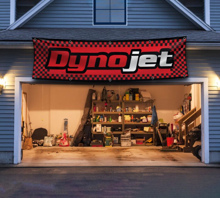 "Enhance your space with this 2x8 ft Dynojet flag banner, perfect for motorcycle enthusiasts and performance parts fans. Featuring bold Dynojet branding and sleek graphics, this banner is an ideal addition to garages, workshops, man caves, or motorcycle show displays. Crafted from durable, high-quality materials, it ensures vibrant colors and long-lasting appeal, suitable for both indoor and outdoor use. Show off your passion for motorcycle tuning and high-performance parts with this eye-catching banner that celebrates Dynojet’s reputation for precision and power. Whether you’re a racer, mechanic, or enthusiast, this Dynojet flag is the ultimate wall décor sign for those who demand performance and style."