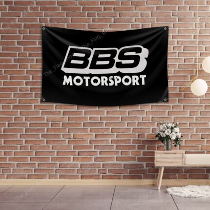 "Show off your love for BBS with this 2x8 ft banner flag. Perfect for car racing enthusiasts, garages, man caves, and shops, this durable banner features bold BBS branding and is ideal for showcasing wheels and rims. Great for indoor and outdoor use, it’s the ultimate décor item to highlight your passion for automotive style and performance."