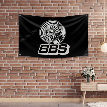 "Show off your love for BBS with this 2x8 ft banner flag. Perfect for car racing enthusiasts, garages, man caves, and shops, this durable banner features bold BBS branding and is ideal for showcasing wheels and rims. Great for indoor and outdoor use, it’s the ultimate décor item to highlight your passion for automotive style and performance."