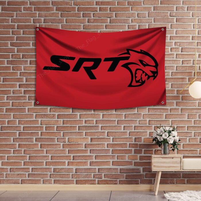 "Showcase your passion for high-performance vehicles with this Dodge SRT flag, perfect for car enthusiasts and racing fans. Featuring bold SRT branding and iconic Dodge graphics, this flag is ideal for garages, man caves, workshops, or car shows. Made from durable, high-quality materials, it’s designed for both indoor and outdoor use. Celebrate the power, speed, and legacy of Dodge SRT with this vibrant and stylish flag, a must-have décor piece for any true fan of American muscle and performance engineering."