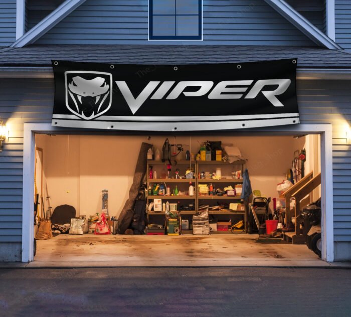 "Celebrate the legacy of the iconic Dodge Viper with this high-quality banner, perfect for car enthusiasts and collectors. Featuring bold Dodge Viper branding and sleek graphics, this banner is ideal for garages, man caves, workshops, or car shows. Crafted from durable materials, it ensures vibrant colors and long-lasting appeal for both indoor and outdoor use. Whether you're showcasing your passion for the Viper’s legendary power and performance or enhancing your automotive décor, this banner is a must-have for fans of American muscle and cutting-edge design."