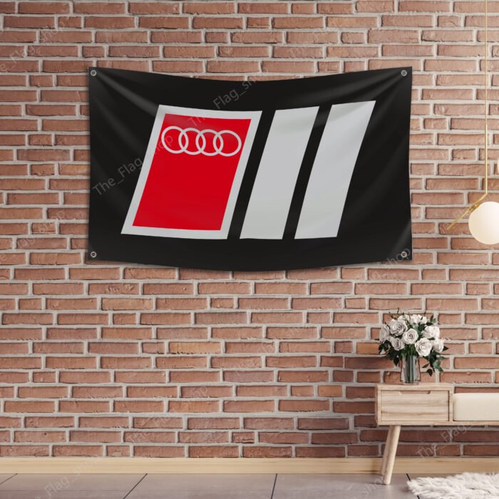 "Showcase your passion for Audi Motorsport with this 3x5 ft banner flag. Ideal for garages, man caves, or as wall décor, this durable flag features eye-catching Audi MotorSport graphics. Perfect for car racing fans, it’s designed for both indoor and outdoor use, making it a great addition to any space where motorsport enthusiasts gather."