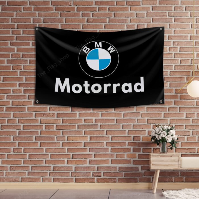 "Show your love for BMW Motorrad with this 3x5 ft banner flag. Ideal for garages, workshops, man caves, and wall décor, this durable flag features bold BMW Motorrad branding. Perfect for both indoor and outdoor use, it’s a must-have sign for motorcycle enthusiasts and fans of the brand’s racing heritage."