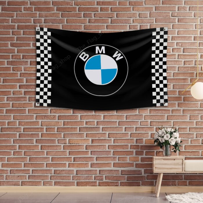 "Deck out your space with this 3x5 ft BMW Checkered flag. Ideal for car racing shows, garages, workshops, and wall décor, this durable banner features bold checkered graphics. Perfect for showcasing your love for motorsport and BMW’s racing heritage, this flag is great for both indoor and outdoor use."