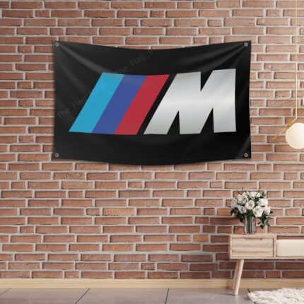 "Enhance your space with this 3x5 ft BMW M Power flag. Perfect for garages, shops, man caves, and wall décor, this durable banner features bold BMW Motorsport branding. Ideal for indoor and outdoor use, it’s a great sign for showcasing your passion for high-performance driving and BMW M Power’s legacy in motorsport."