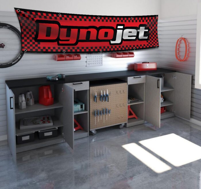 "Enhance your space with this 2x8 ft Dynojet flag banner, perfect for motorcycle enthusiasts and performance parts fans. Featuring bold Dynojet branding and sleek graphics, this banner is an ideal addition to garages, workshops, man caves, or motorcycle show displays. Crafted from durable, high-quality materials, it ensures vibrant colors and long-lasting appeal, suitable for both indoor and outdoor use. Show off your passion for motorcycle tuning and high-performance parts with this eye-catching banner that celebrates Dynojet’s reputation for precision and power. Whether you’re a racer, mechanic, or enthusiast, this Dynojet flag is the ultimate wall décor sign for those who demand performance and style."