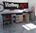 "Showcase your passion for high-performance racing with this 2x8 ft Holley EFI (Electronic Fuel Injection) Banner. Featuring bold Holley EFI branding, this flag is perfect for dirt racing enthusiasts, car racers, and fans of cutting-edge automotive technology. Crafted from durable materials, it ensures vibrant colors and long-lasting performance, making it suitable for both indoor and outdoor use. Ideal for your man cave, garage, or racing workshop, this banner celebrates the power and precision of Holley's fuel injection systems in the world of motorsports. Add a dynamic touch to your space with this stylish décor piece that highlights your love for racing and performance engineering."