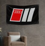 "Showcase your passion for Audi Motorsport with this 3x5 ft banner flag. Ideal for garages, man caves, or as wall décor, this durable flag features eye-catching Audi MotorSport graphics. Perfect for car racing fans, it’s designed for both indoor and outdoor use, making it a great addition to any space where motorsport enthusiasts gather."