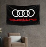 "Show your appreciation for Audi quattro with this 3x5 ft flag. Ideal for car racing shows, garages, man caves, and wall décor, this durable banner features the iconic Audi quattro branding. Perfect for indoor and outdoor use, it’s a must-have sign for motorsport enthusiasts looking to display their passion for legendary performance and all-wheel drive excellence."