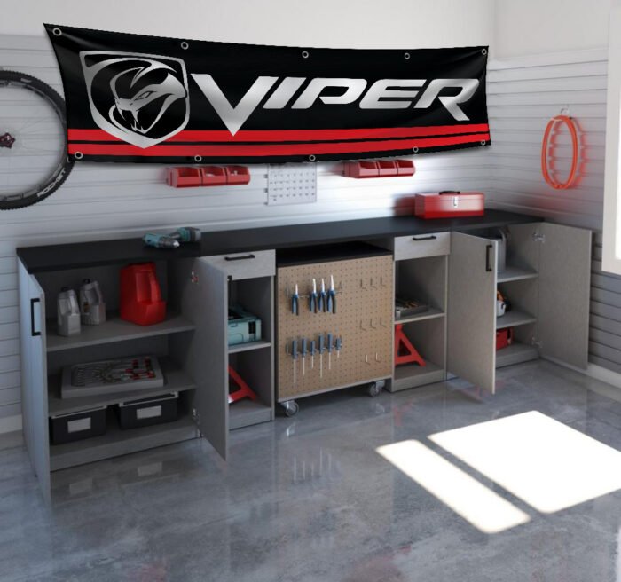 "Celebrate the legacy of the iconic Dodge Viper with this high-quality banner, perfect for car enthusiasts and collectors. Featuring bold Dodge Viper branding and sleek graphics, this banner is ideal for garages, man caves, workshops, or car shows. Crafted from durable materials, it ensures vibrant colors and long-lasting appeal for both indoor and outdoor use. Whether you're showcasing your passion for the Viper’s legendary power and performance or enhancing your automotive décor, this banner is a must-have for fans of American muscle and cutting-edge design."